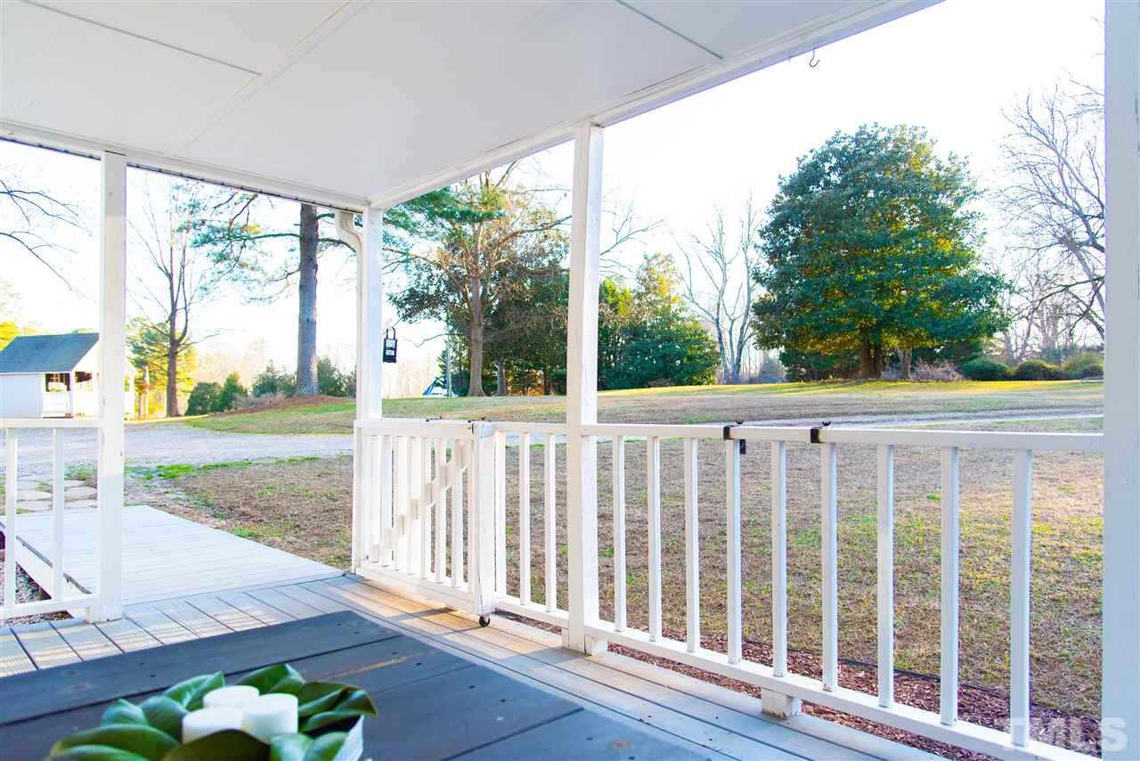 2421 Kearney Road Wake Forest, NC 27587 - Photo 25 of 30 a view of a deck with a yard