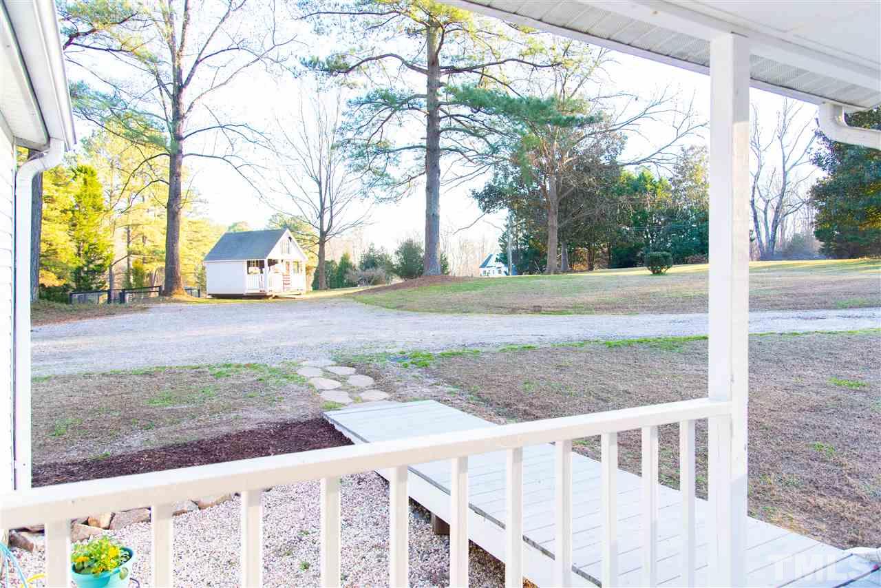 2421 Kearney Road Wake Forest, NC 27587 - Photo 27 of 30 a view of a yard and tree in the background