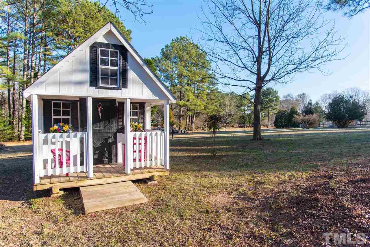 2421 Kearney Road Wake Forest, NC 27587 - Photo 28 of 30 a front view of a house with garden