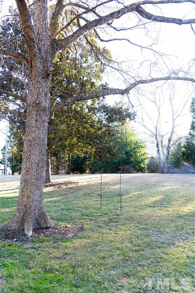 2421 Kearney Road Wake Forest, NC 27587 - Photo 29 of 30 a view of a yard with a tree