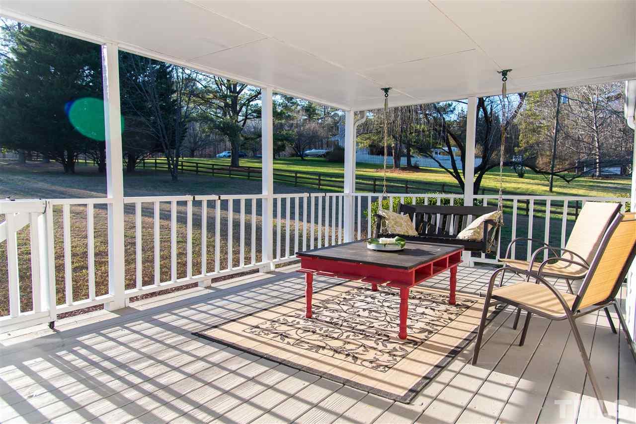 2421 Kearney Road Wake Forest, NC 27587 - Photo 6 of 30 a view of a chairs on the deck