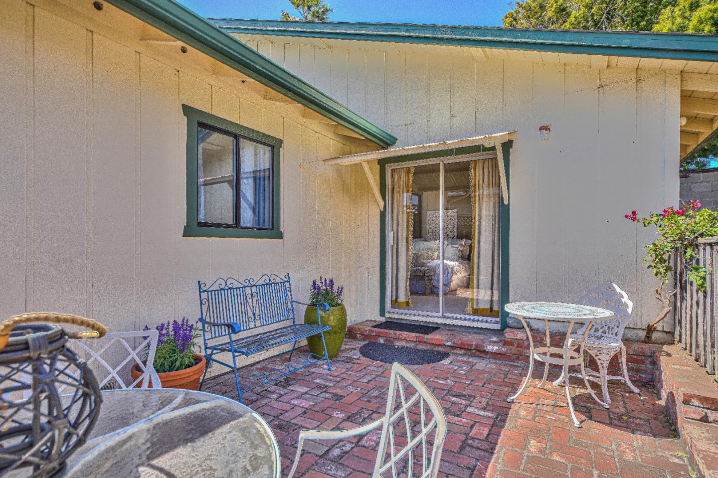 1868 Judson Street Seaside, CA 93955 - Photo 22 of 34 a view of a patio with table and chairs and potted plants