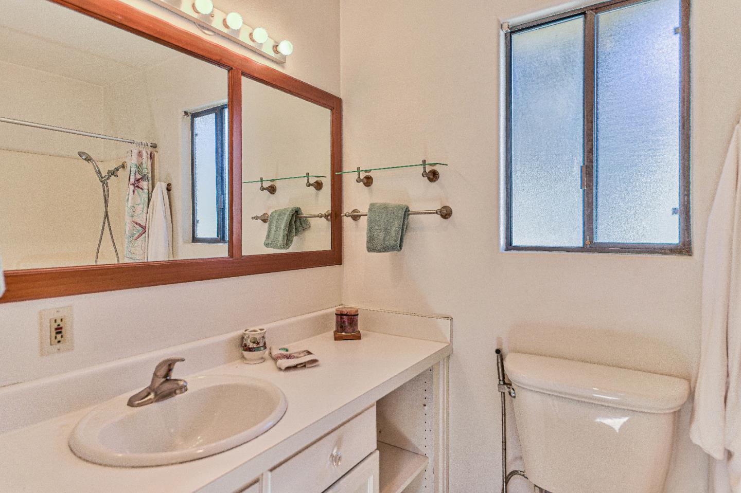 1868 Judson Street Seaside, CA 93955 - Photo 25 of 34 a bathroom with a sink and a mirror