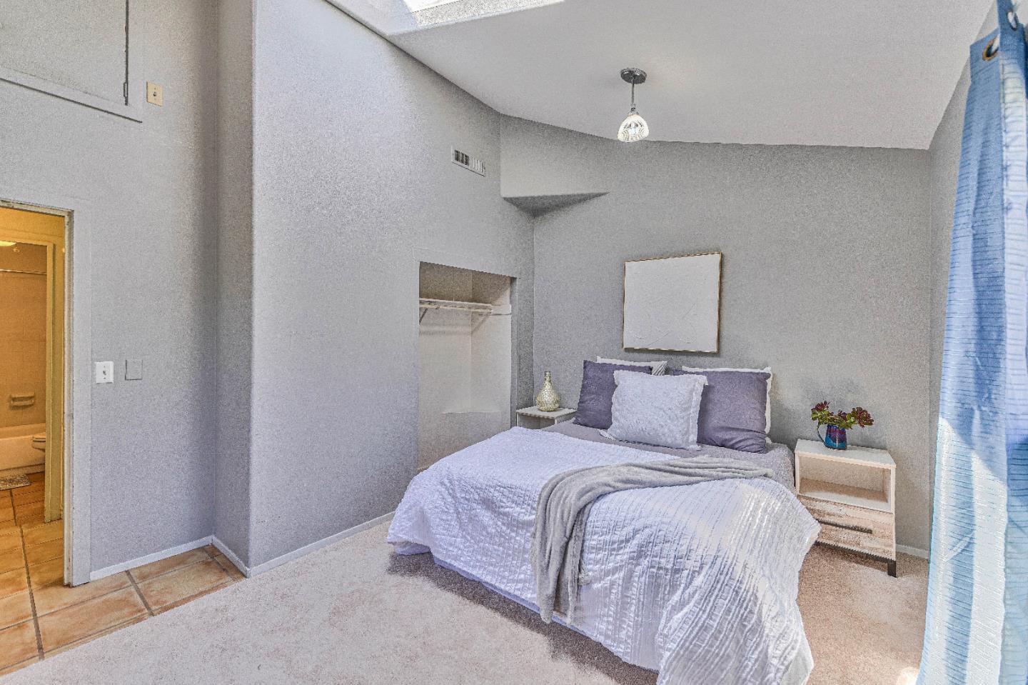 1868 Judson Street Seaside, CA 93955 - Photo 28 of 34 a bedroom with a bed and a painting