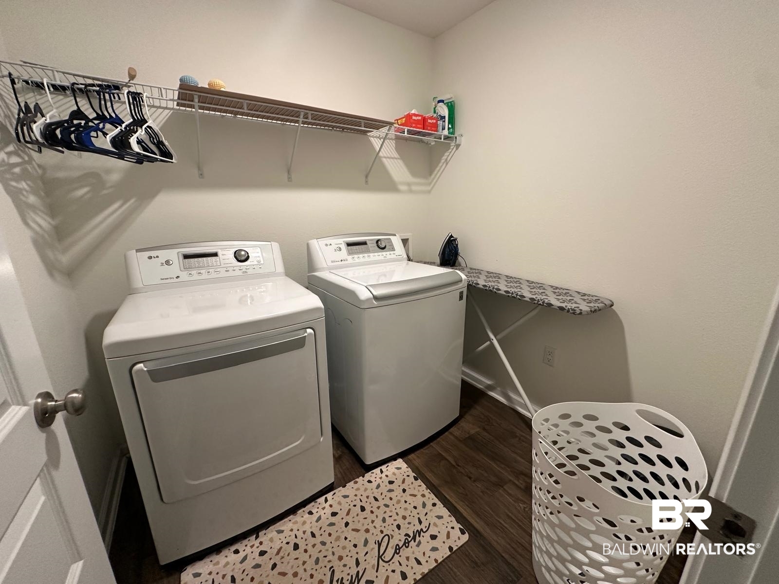23792 Unbridled Loop Daphne, AL 36526 - Photo 28 of 36 Laundry room with separate washer and dryer and dark wood-style floors