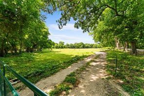 1213 South Houston School Road Lancaster, TX 75146 - Photo 2 of 8 a view of a garden with an outdoor space