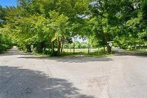 a view of road with trees
