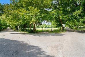 1213 South Houston School Road Lancaster, TX 75146 - Photo 8 of 8 a view of road with trees