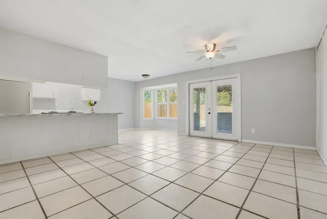 a view of an empty room and window