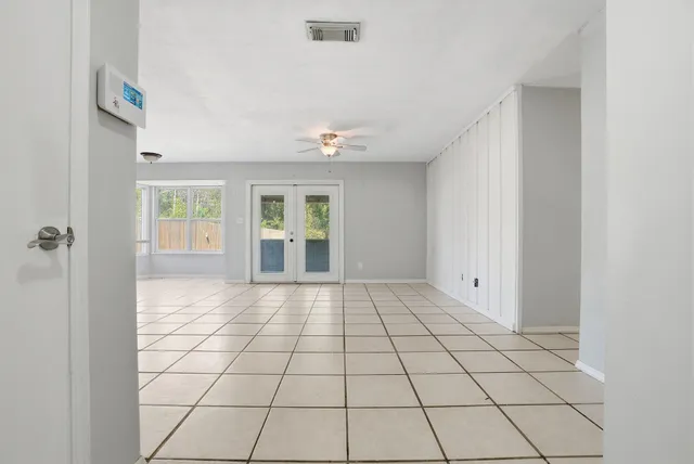 a view of an empty room and window