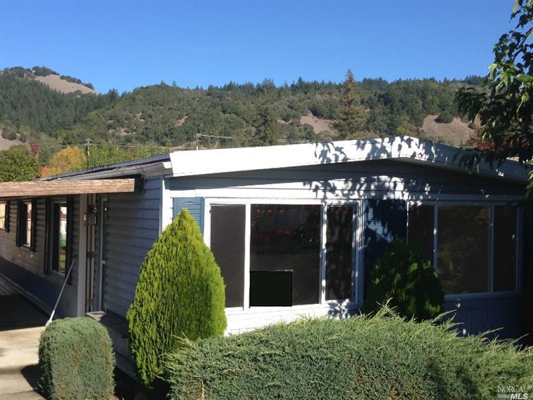 36 Springhill Court, Unit 36 Santa Rosa, CA 95409 - Photo 1 of 1 a view of a house with a yard and potted plants