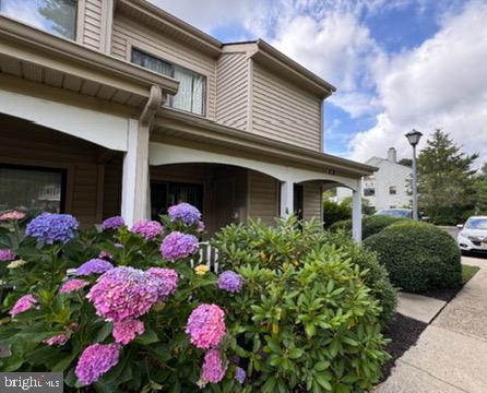 203 Gregorys Way Voorhees, NJ 08043 - Photo 2 of 10 a front view of a house