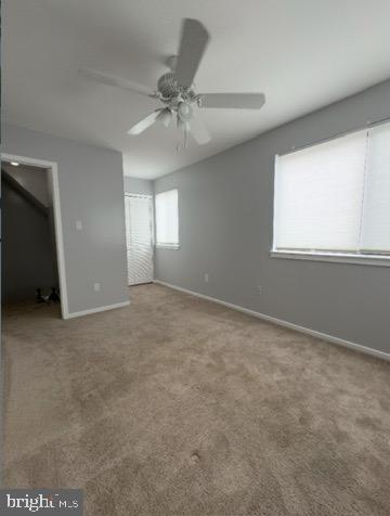 203 Gregorys Way Voorhees, NJ 08043 - Photo 6 of 10 an empty room with windows and fan