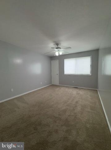 203 Gregorys Way Voorhees, NJ 08043 - Photo 7 of 10 an empty room with a empty space and windows