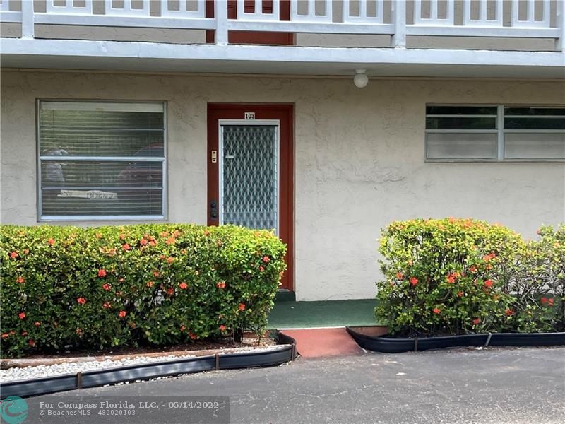 3541 Inverrary Drive, Unit 103 Lauderhill, FL 33319 - Photo 2 of 18 a front view of a house