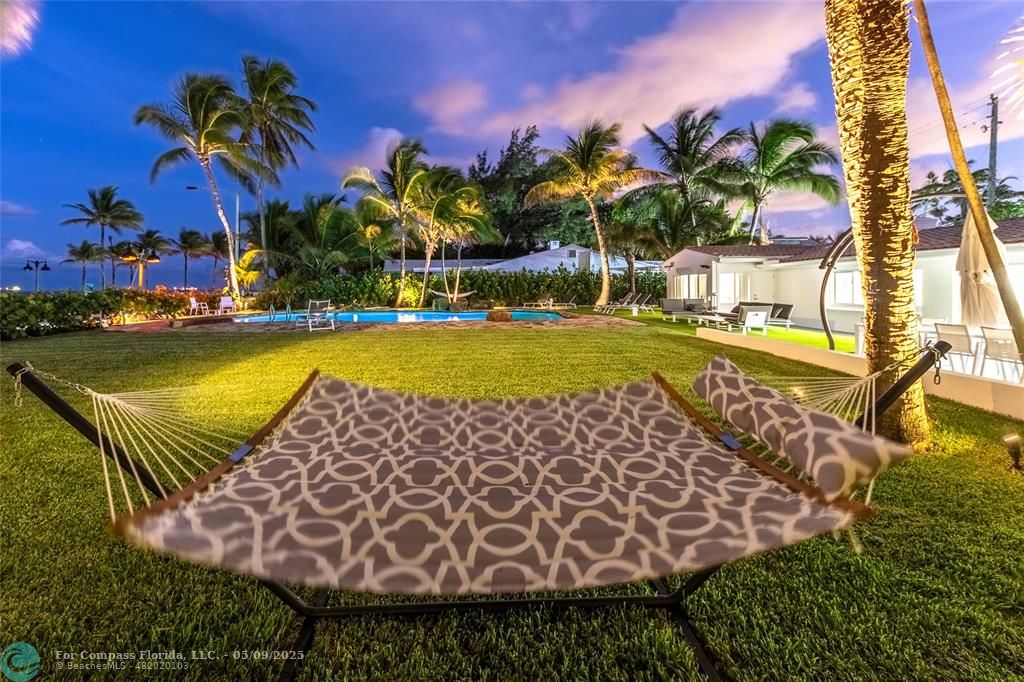 1663 North Fort Lauderdale Beach Boulevard Fort Lauderdale, FL 33305 - Photo 11 of 39 a view of a swimming pool with lounge chair