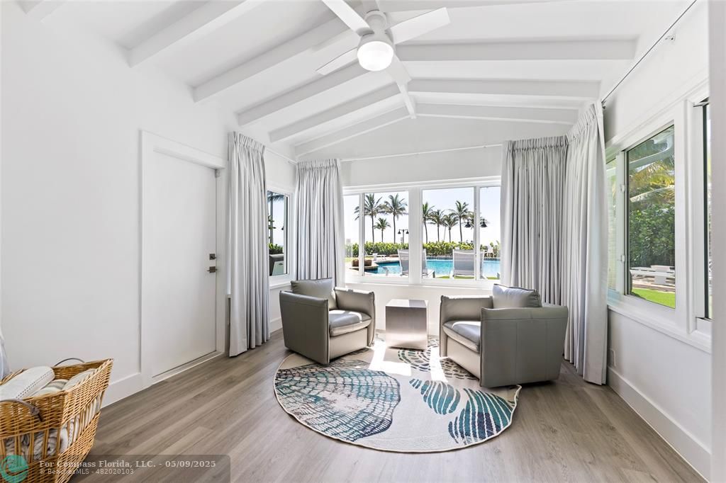 1663 North Fort Lauderdale Beach Boulevard Fort Lauderdale, FL 33305 - Photo 19 of 39 a living room with furniture and a large window