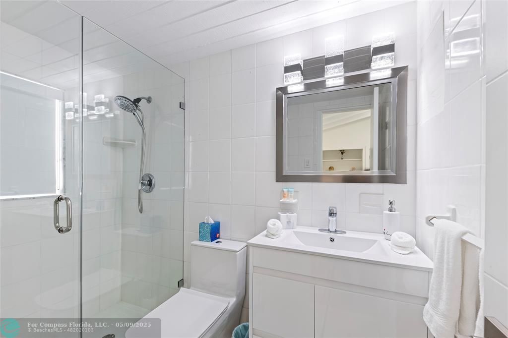 1663 North Fort Lauderdale Beach Boulevard Fort Lauderdale, FL 33305 - Photo 21 of 39 a bathroom with a sink toilet and shower