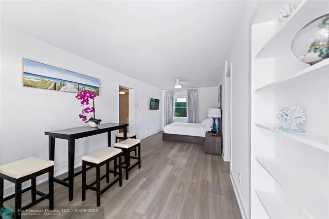 a view of a livingroom with furniture and wooden floor