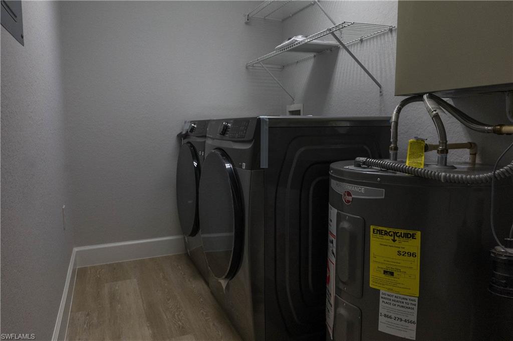 8234 Key Royal Circle, Unit 523 Naples, FL 34119 - Photo 8 of 20 a view of storage and utility room