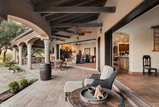 a living room with furniture and a table
