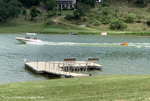 a view of yard with swimming pool and outdoor seating
