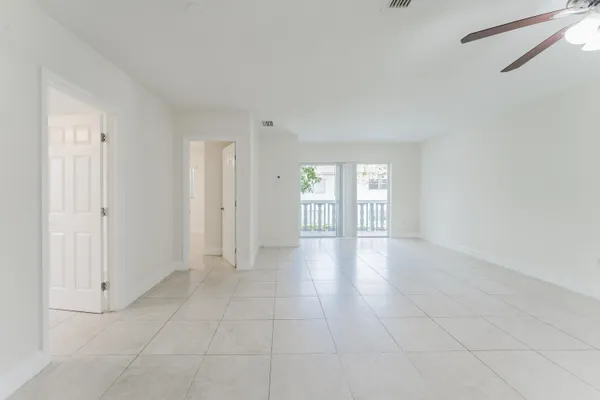 a view of an empty room and window