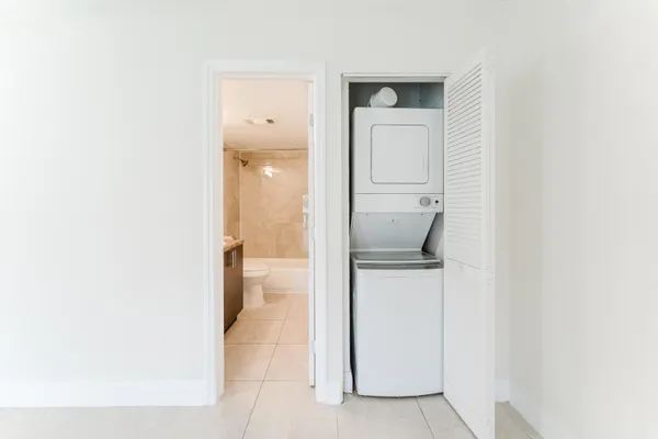 a view of a bathroom from a hallway