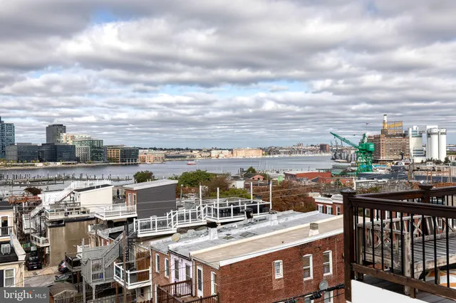 a view of balcony with furniture