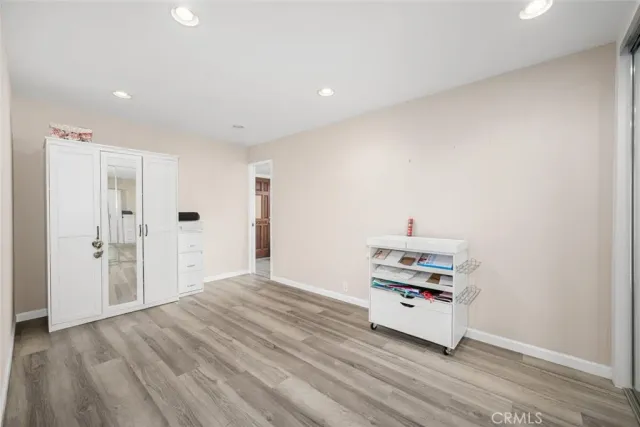 a view of a livingroom with wooden floor