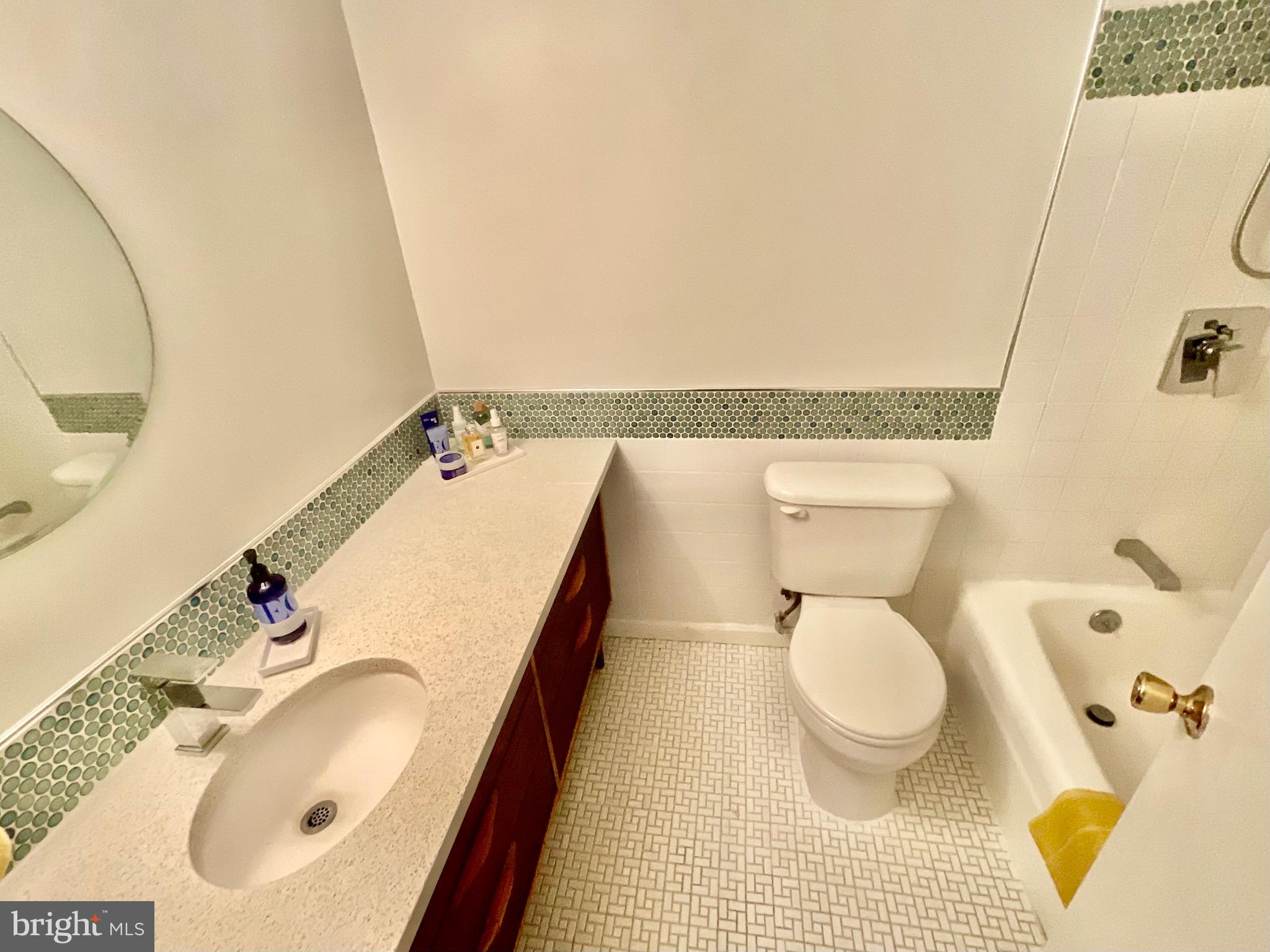 2509 Baltimore Road, Unit 4 Rockville, MD 20853 - Photo 16 of 27 Renovated bathroom with tile accents