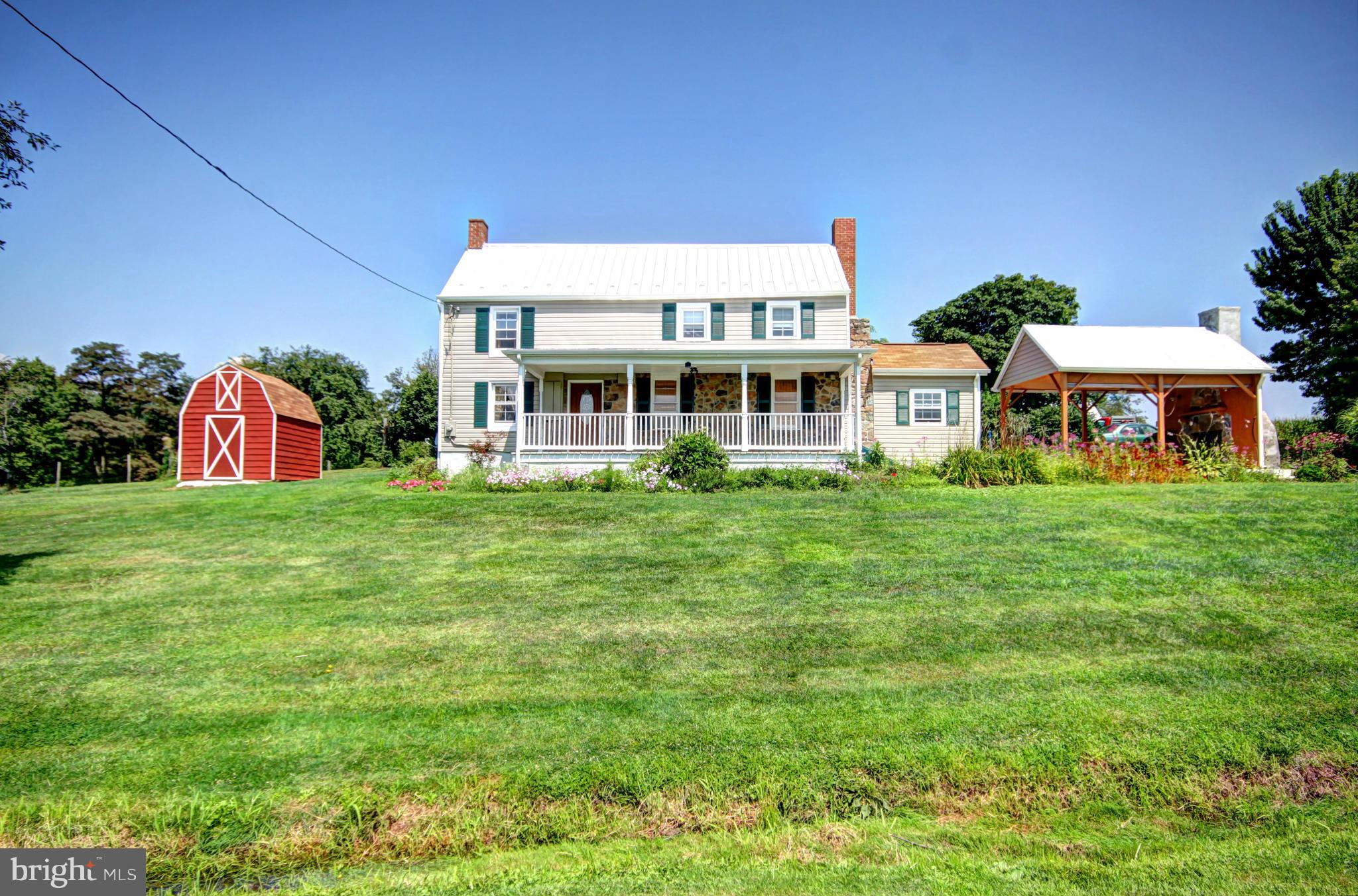 7295 Keysville Road Keymar, MD 21757 - Photo 1 of 25 a view of a house with a backyard