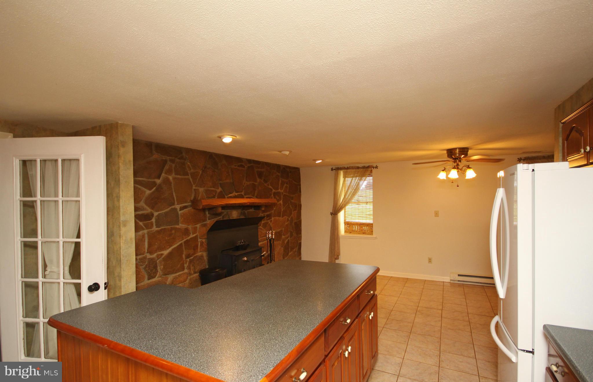 7295 Keysville Road Keymar, MD 21757 - Photo 5 of 25 a view of a kitchen with furniture and a kitchen
