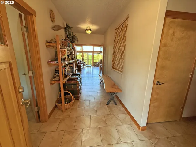 a view of a livingroom with furniture and a window