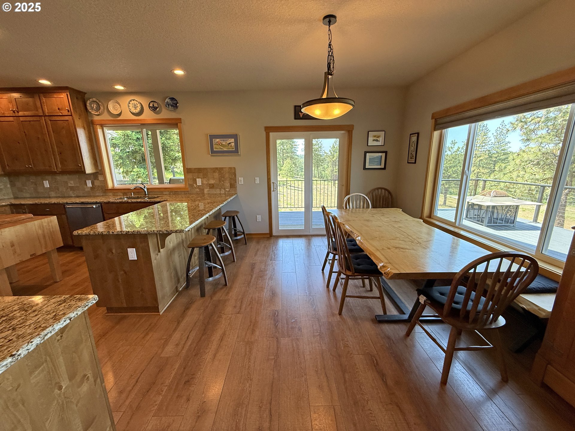 12 Keystone Drive Goldendale, WA 98620 - Photo 17 of 48 a view of a dining room with furniture window and wooden floor