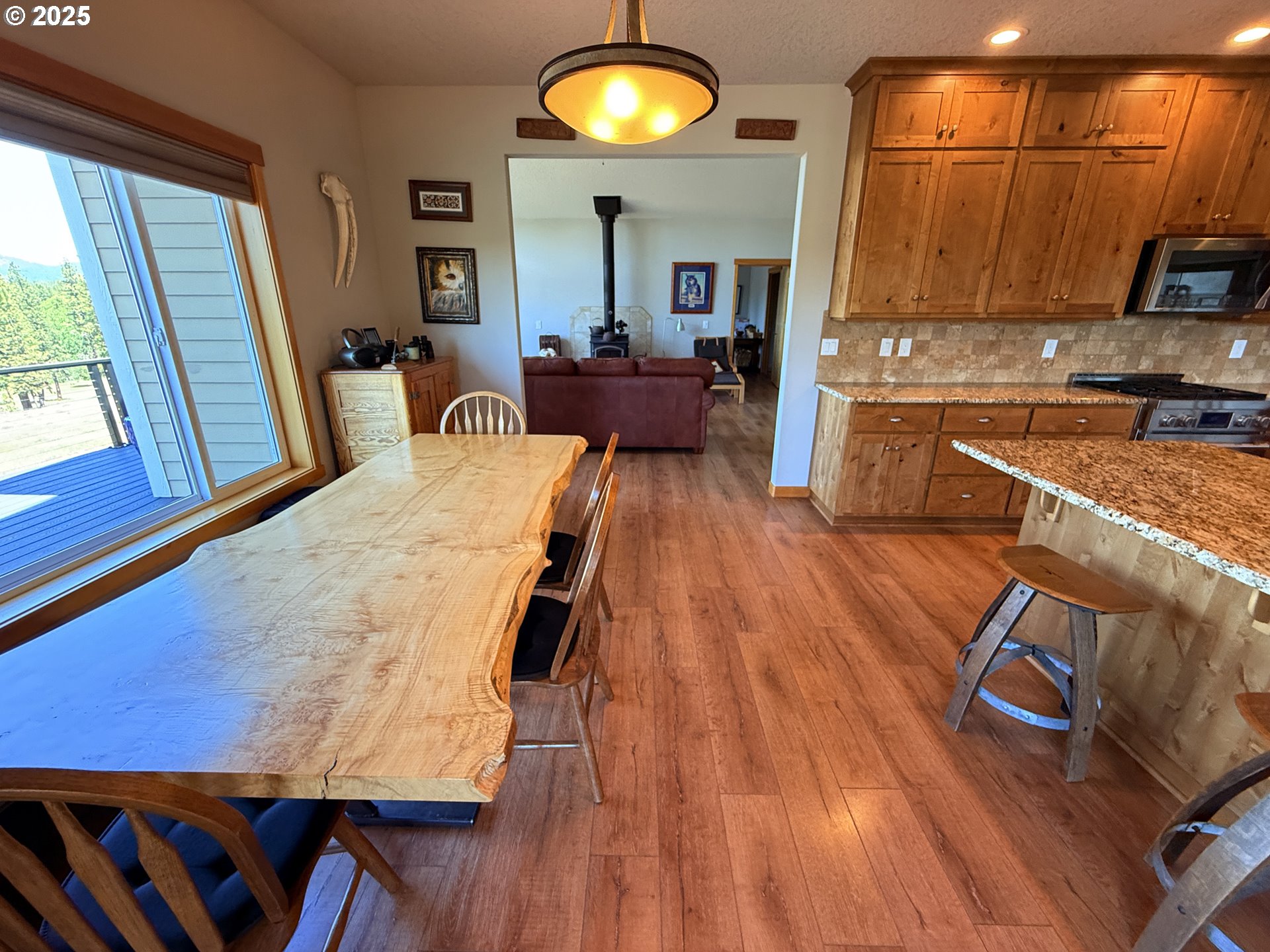12 Keystone Drive Goldendale, WA 98620 - Photo 19 of 48 a view of a kitchen with kitchen island and stainless steel appliances