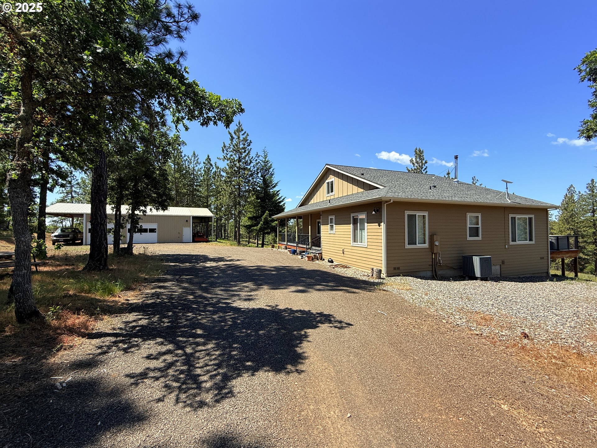 12 Keystone Drive Goldendale, WA 98620 - Photo 3 of 48 a front view of a house with a yard