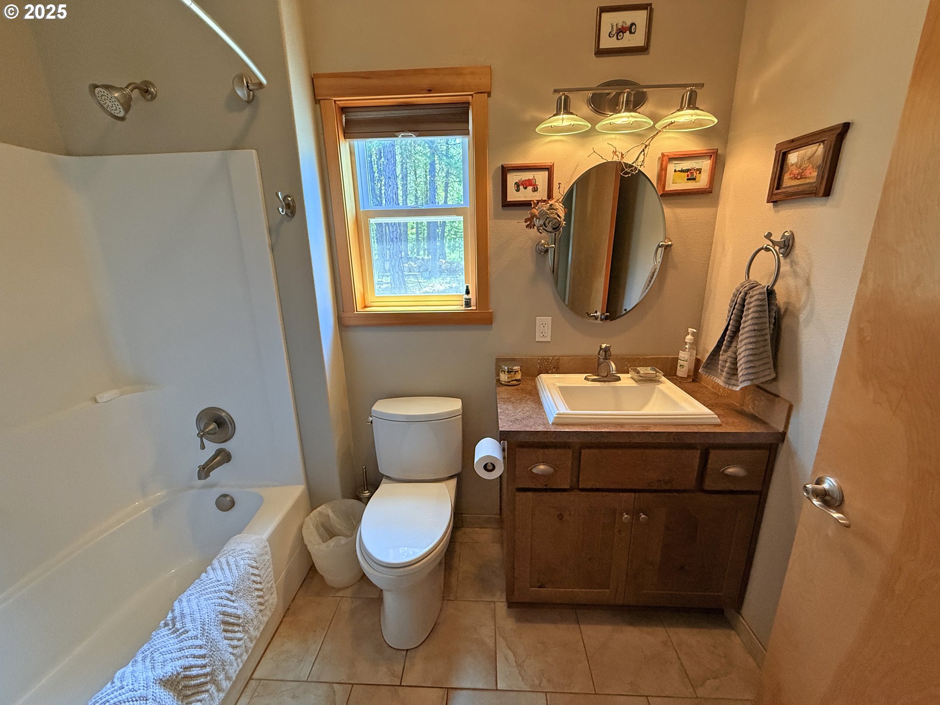 12 Keystone Drive Goldendale, WA 98620 - Photo 35 of 48 a bathroom with a toilet sink and mirror