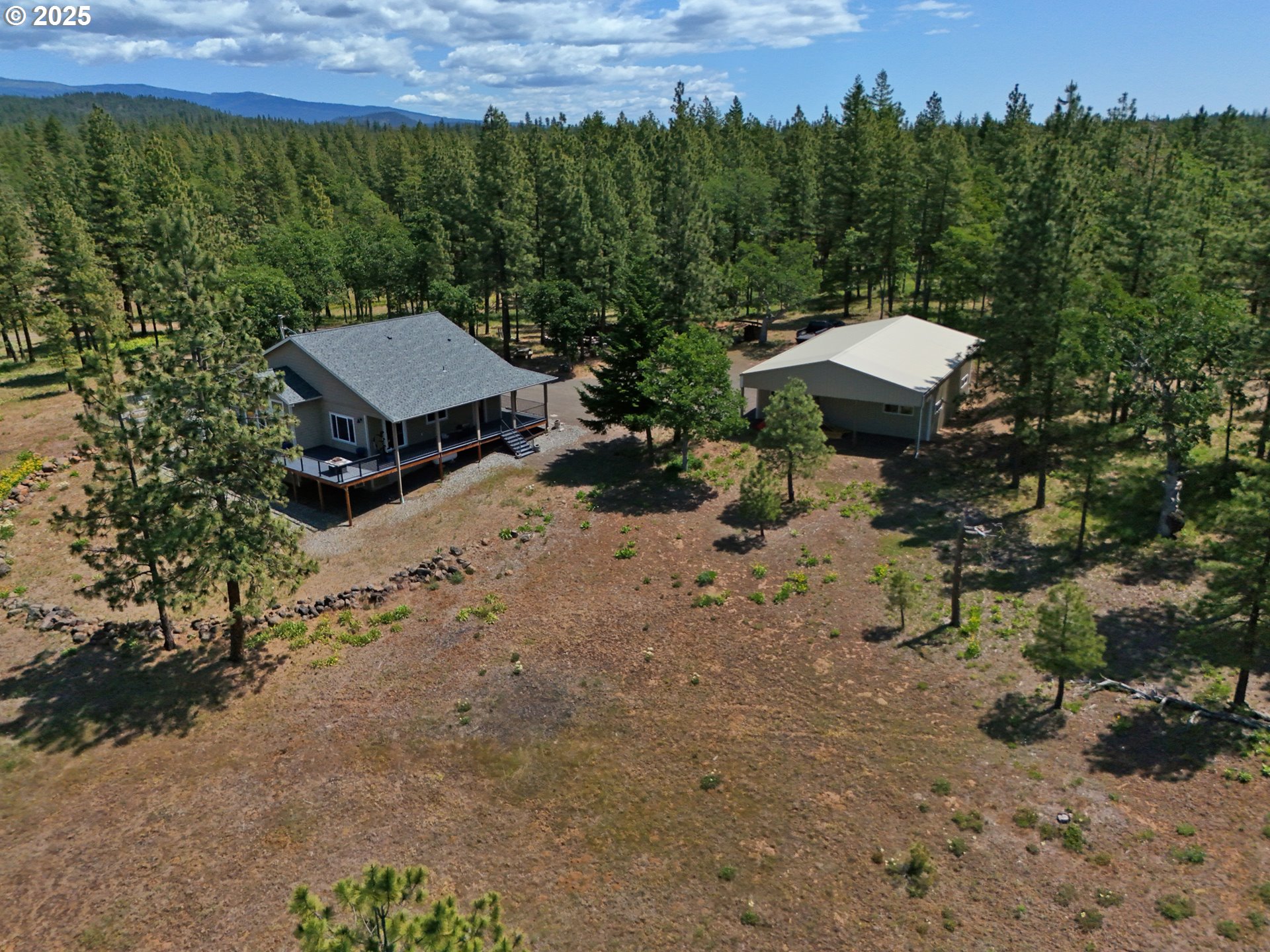 12 Keystone Drive Goldendale, WA 98620 - Photo 41 of 48 a view of a house with a yard and sitting area
