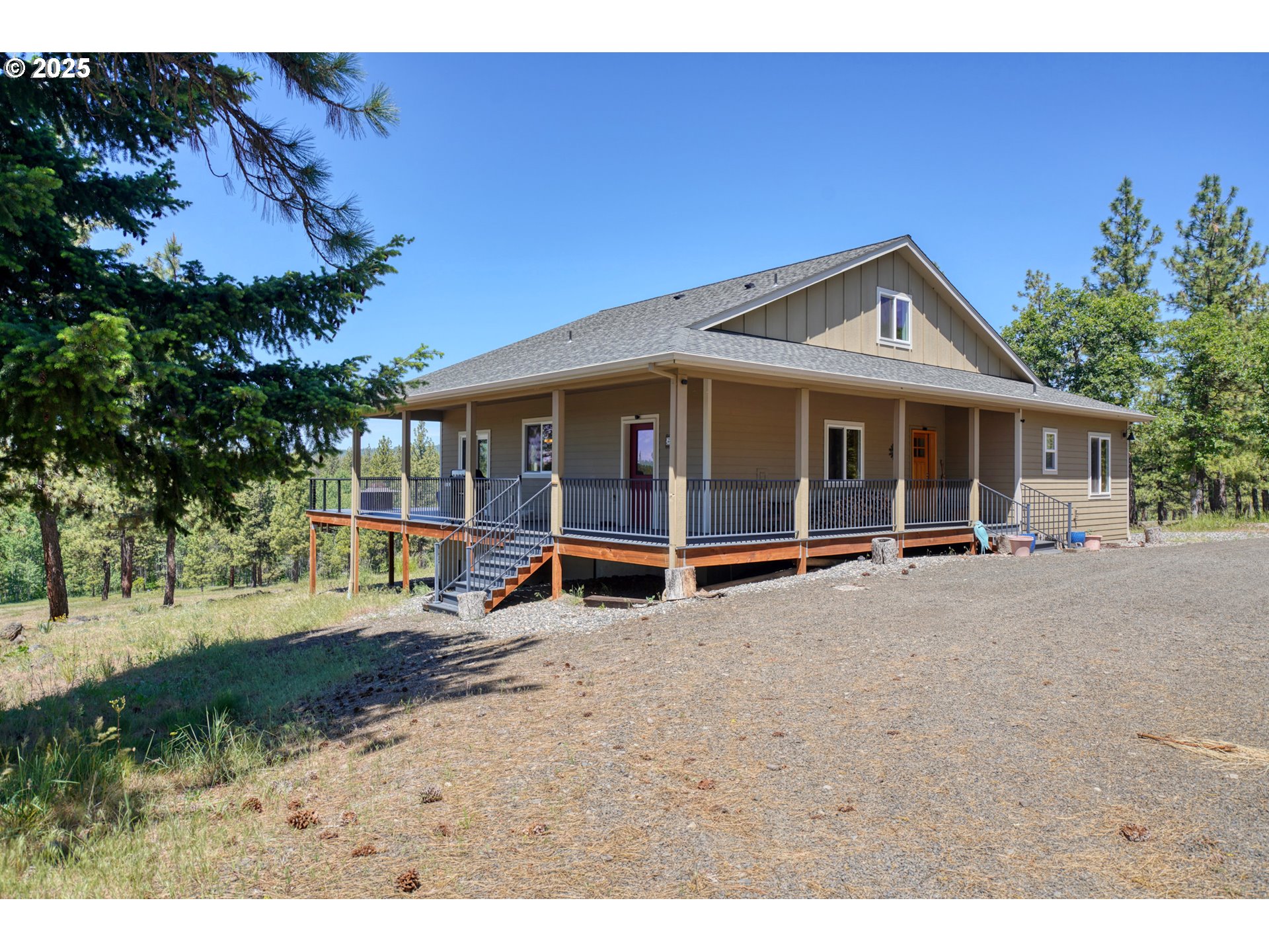 12 Keystone Drive Goldendale, WA 98620 - Photo 8 of 48 a view of a house with backyard porch and sitting area