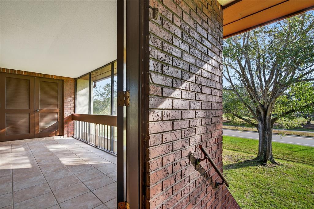 214 Caryl Way Oldsmar, FL 34677 - Photo 13 of 44 a view of a house with a porch