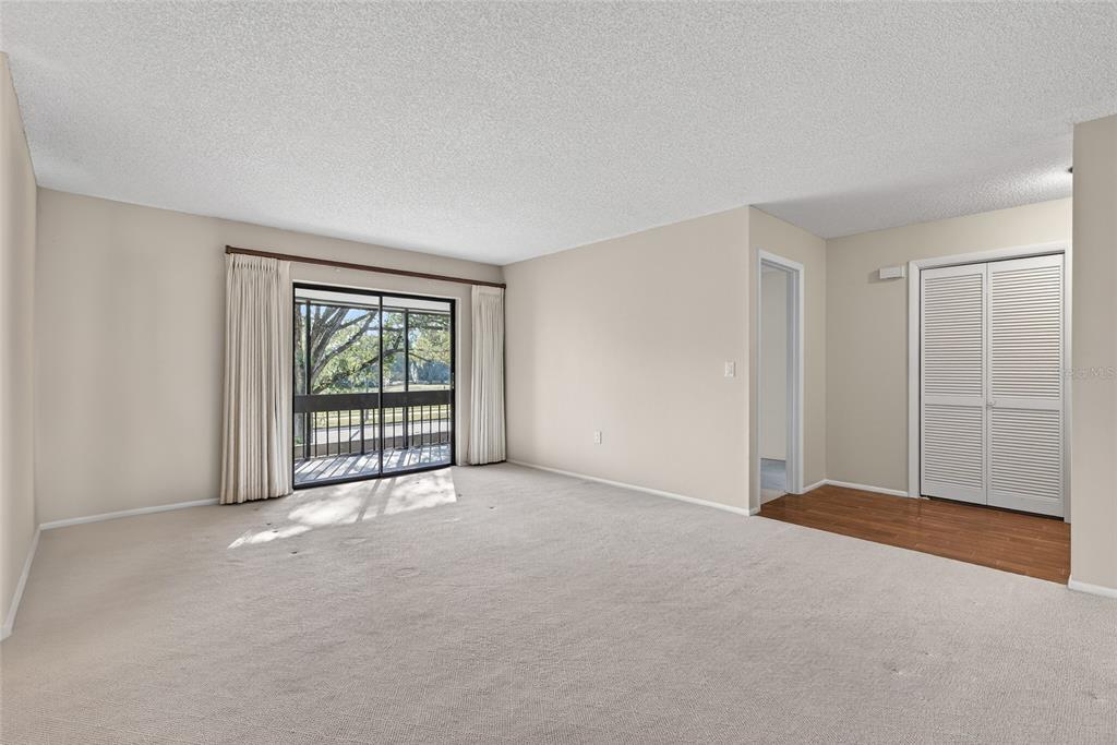 214 Caryl Way Oldsmar, FL 34677 - Photo 8 of 44 a view of an empty room with a window