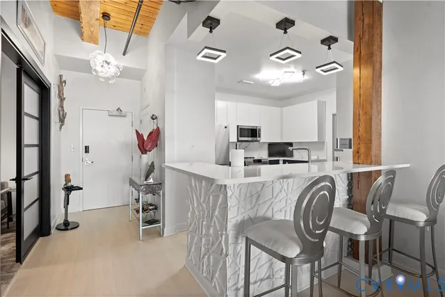 a view of a workspace with furniture