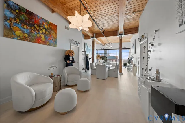 a living room with furniture and a table