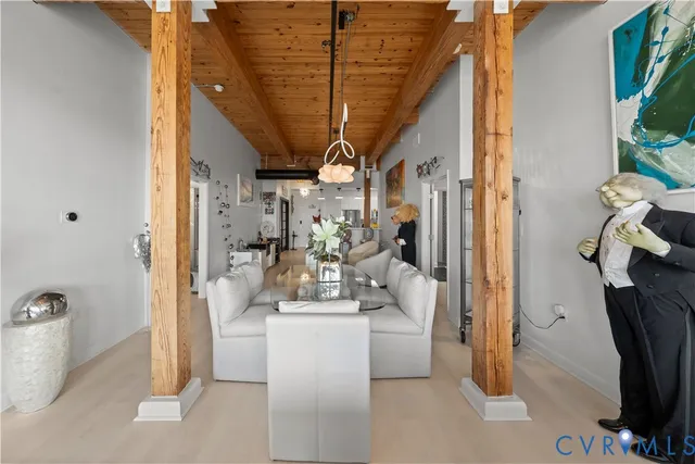 a room with furniture and a potted plant