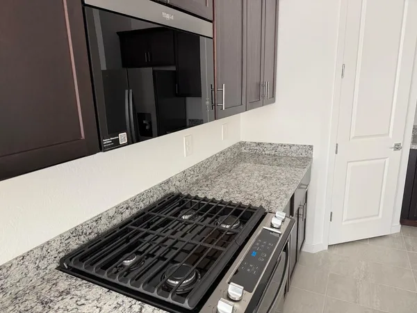 a close view of a stove in the kitchen