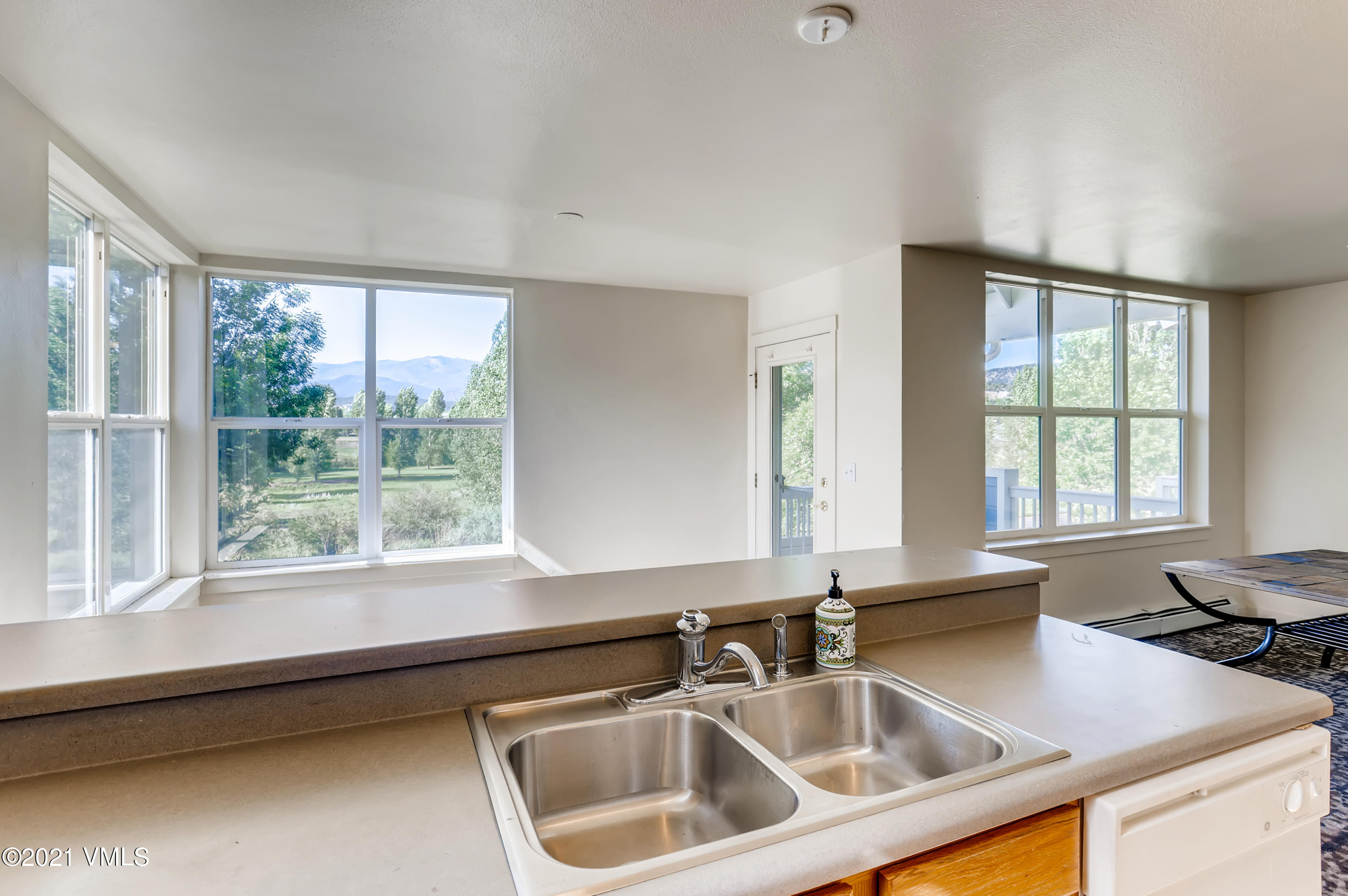 530 Founders Avenue, Unit A201 Eagle, CO 81631 - Photo 13 of 27 a kitchen with a sink and a window