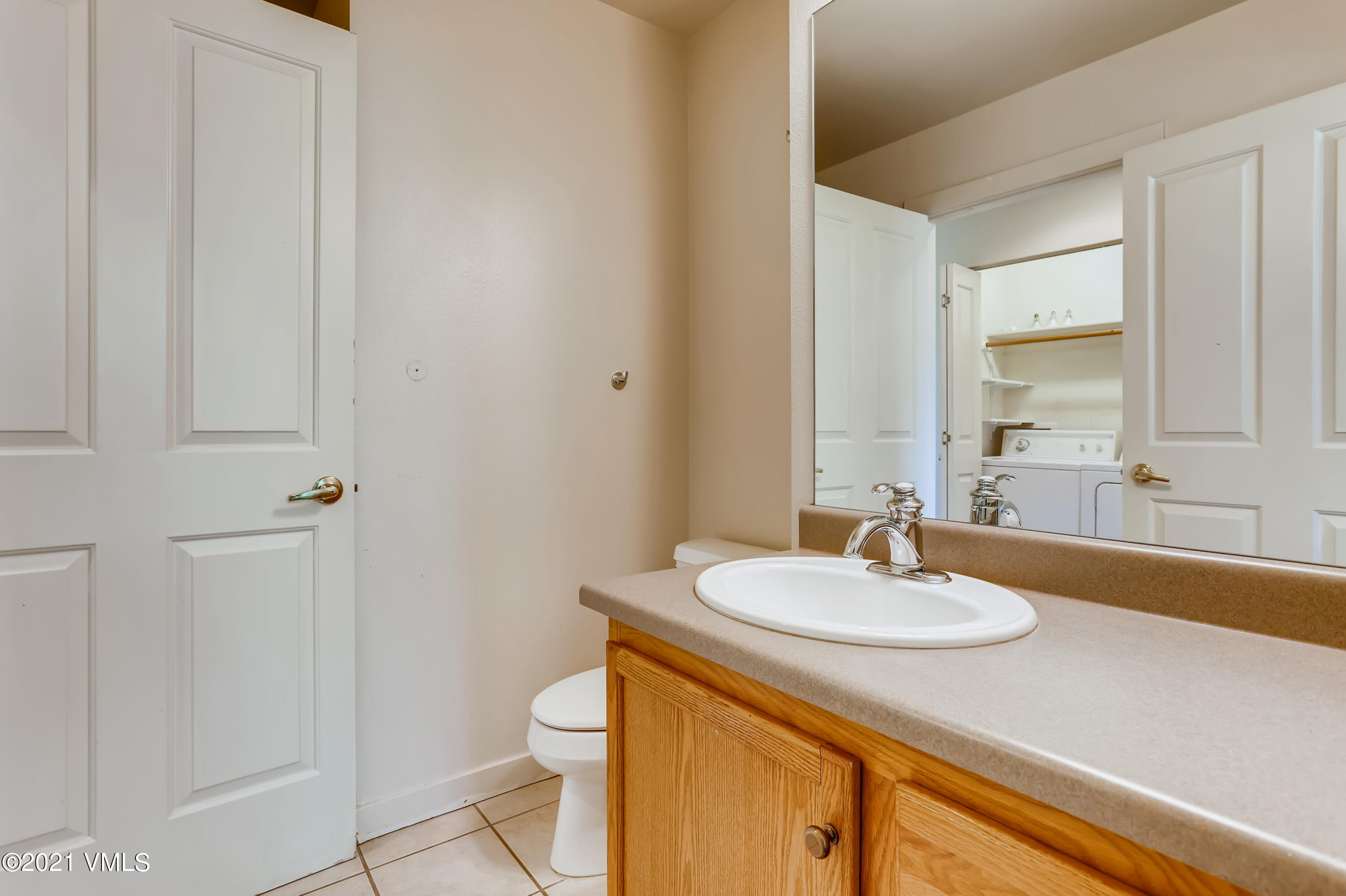 530 Founders Avenue, Unit A201 Eagle, CO 81631 - Photo 21 of 27 a bathroom with a sink and a mirror