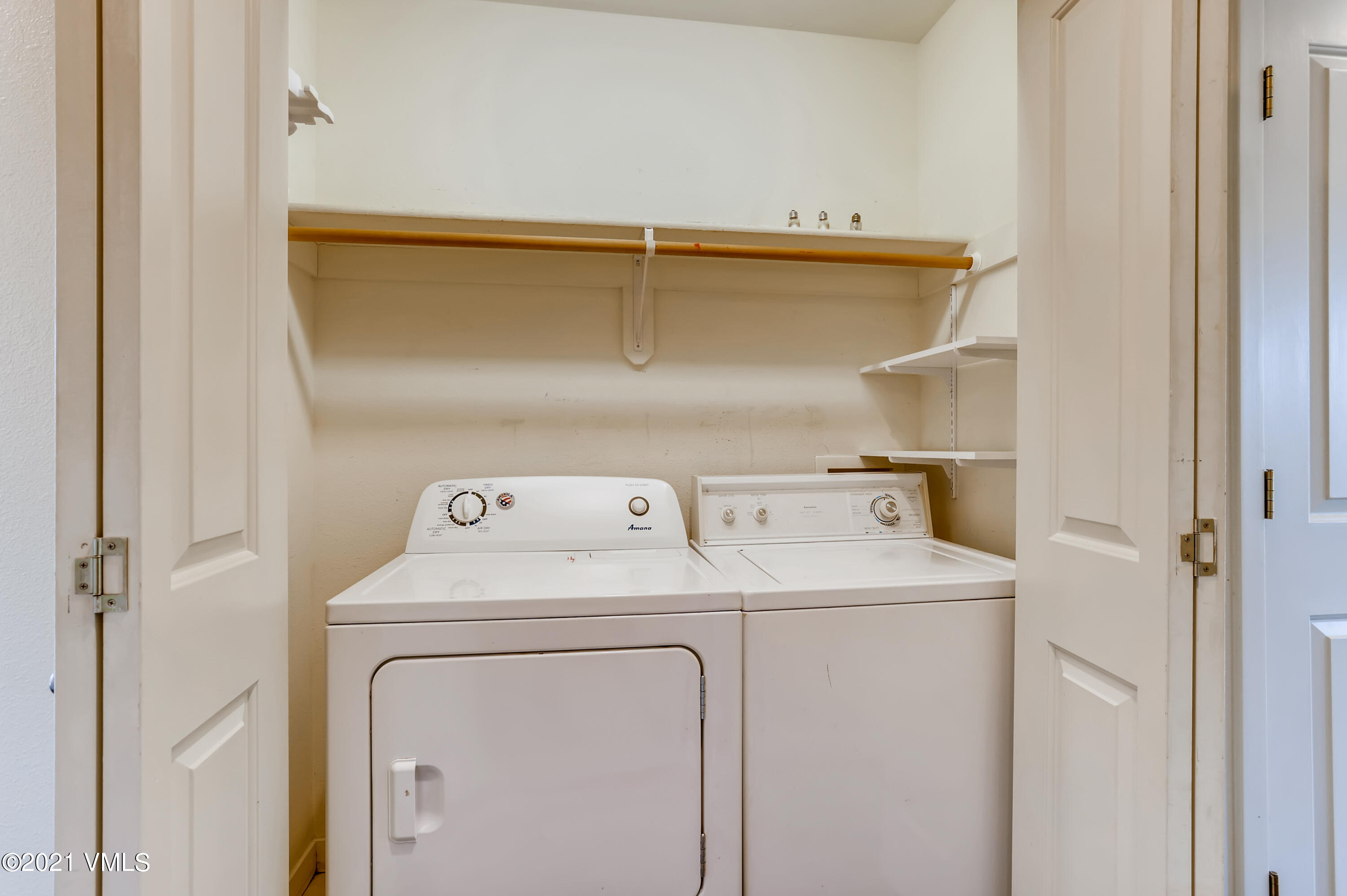 530 Founders Avenue, Unit A201 Eagle, CO 81631 - Photo 22 of 27 a utility room with dryer and washer