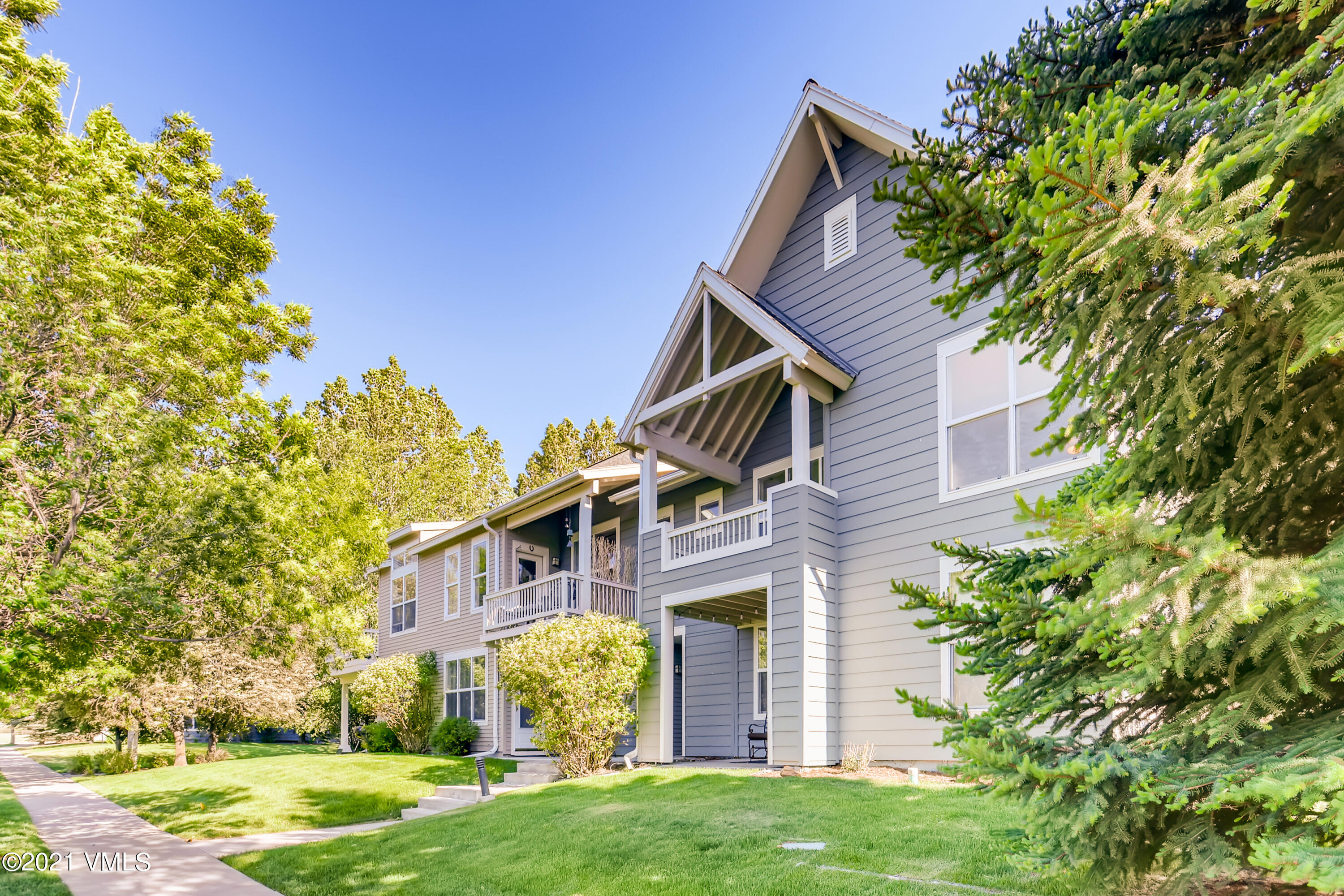 530 Founders Avenue, Unit A201 Eagle, CO 81631 - Photo 24 of 27 front view of a house with a yard